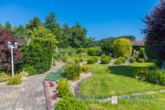 Gelegenheit: EBK-Bungalow mit traumhaft angelegtem Garten, mit 2 Grundstücken in 23747 Dahme - Garten