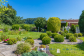 Gelegenheit: EBK-Bungalow mit traumhaft angelegtem Garten, mit 2 Grundstücken in 23747 Dahme - Garten